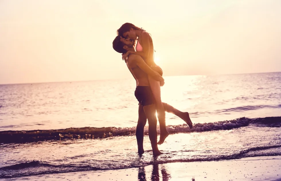 Steamy kiss on a beach