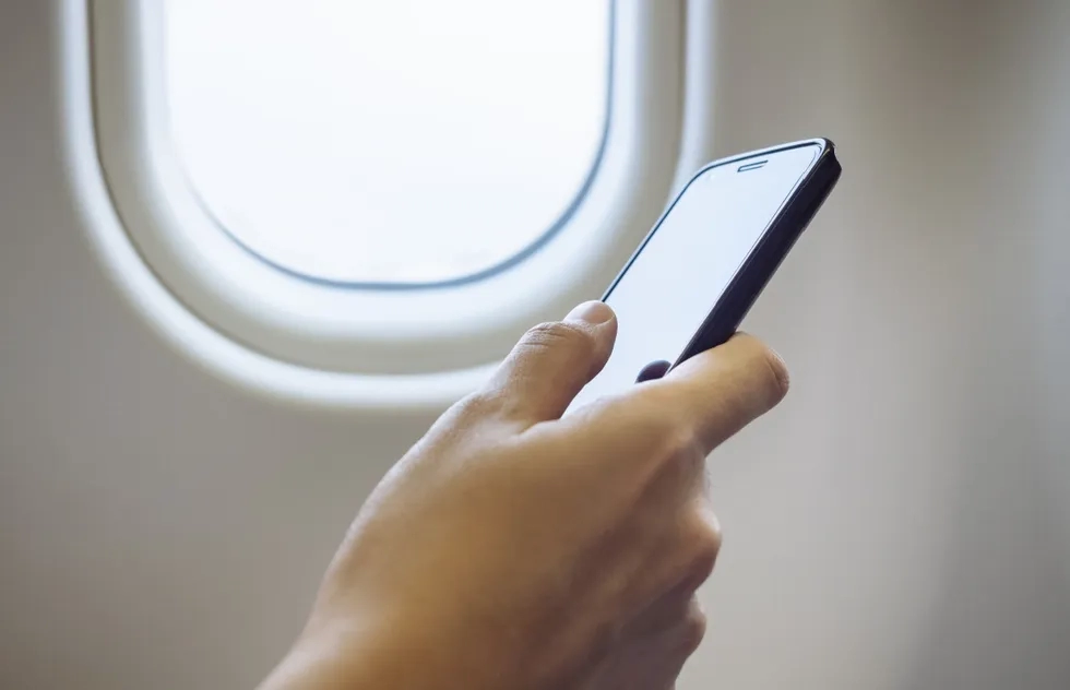 Using a cell phone on an airplane