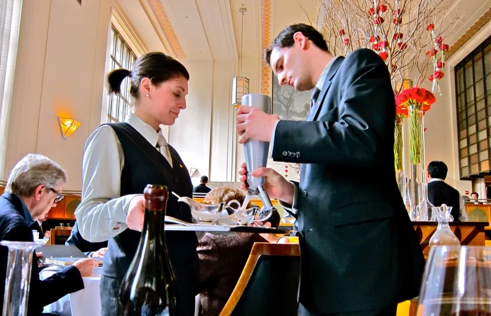 Servers at Eleven Madison Park in New York City.
