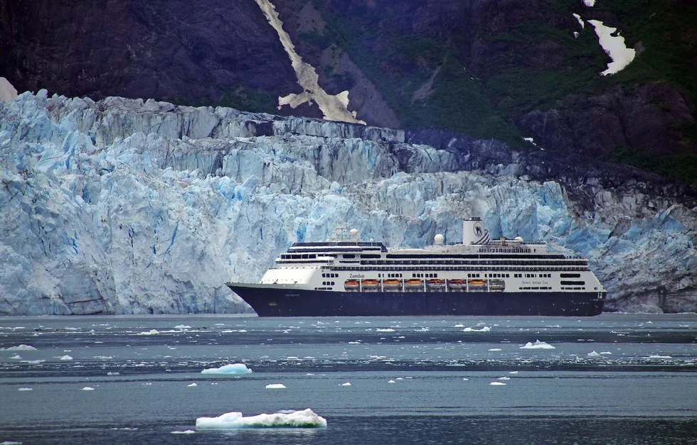 Holland America cruise ship looking small in Glacier Bay
