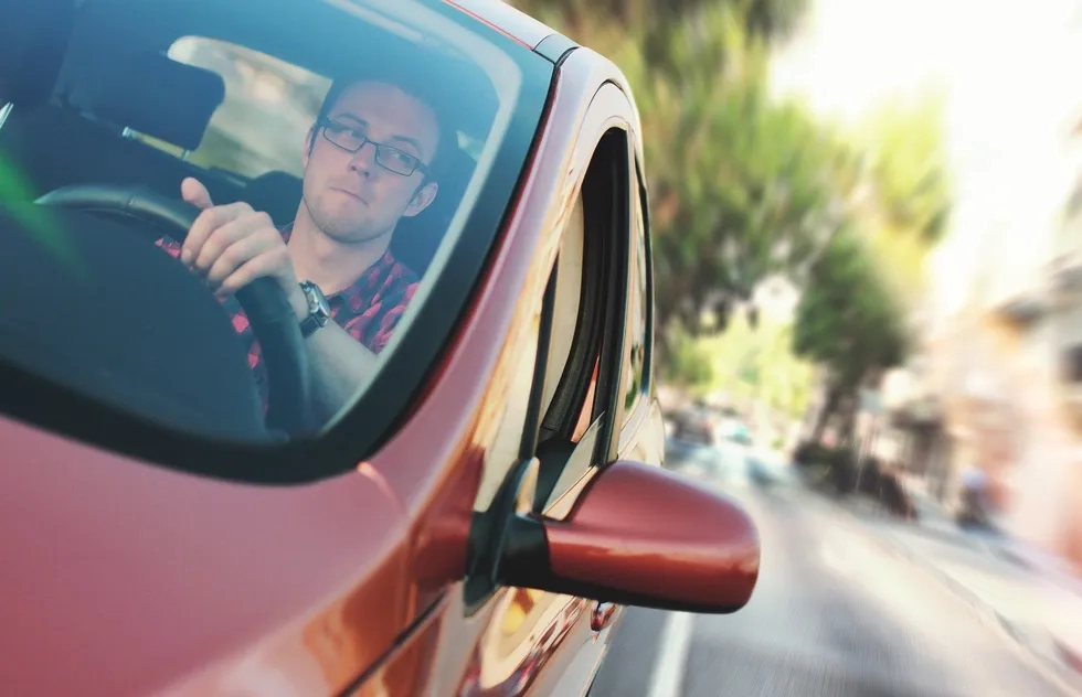 Man driving car