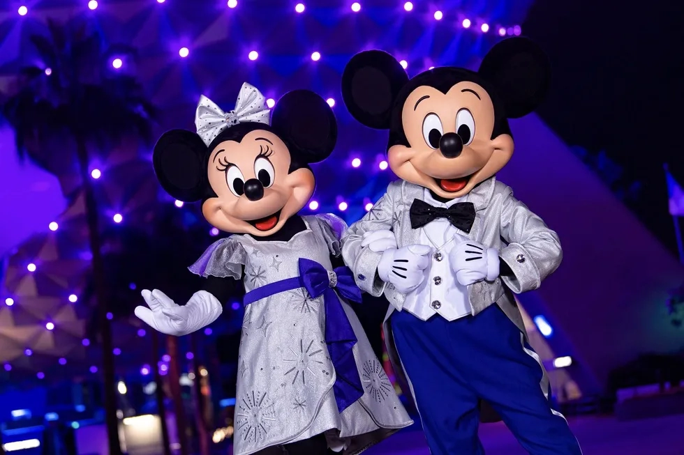 Mickey Mouse and Minnie Mouse in Disney 100 costume at EPCOT, 2023