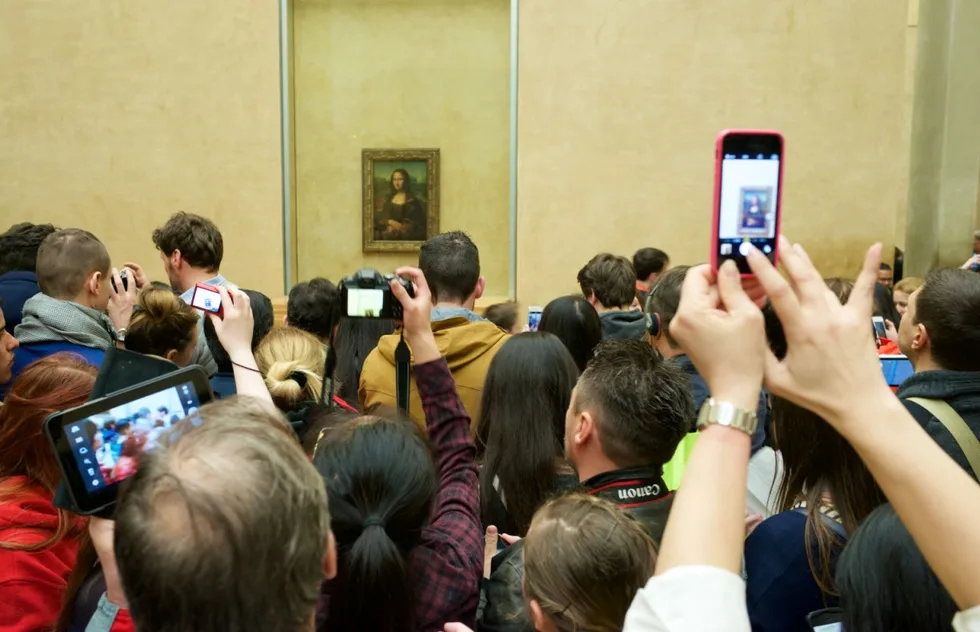 Overcrowding in front of the Mona Lisa at the Louvre Museum in Paris