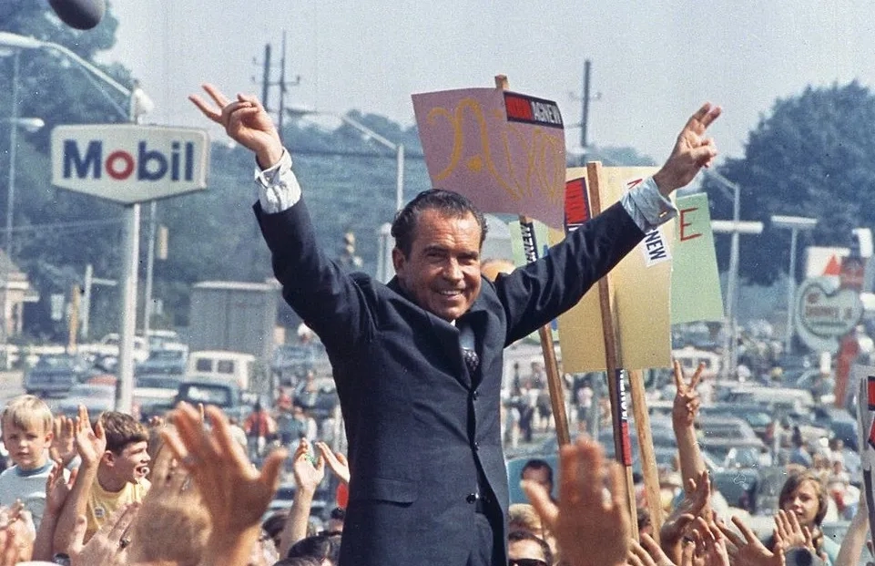 Richard Nixon greets a crowd during his 1968 presidential campaign.
