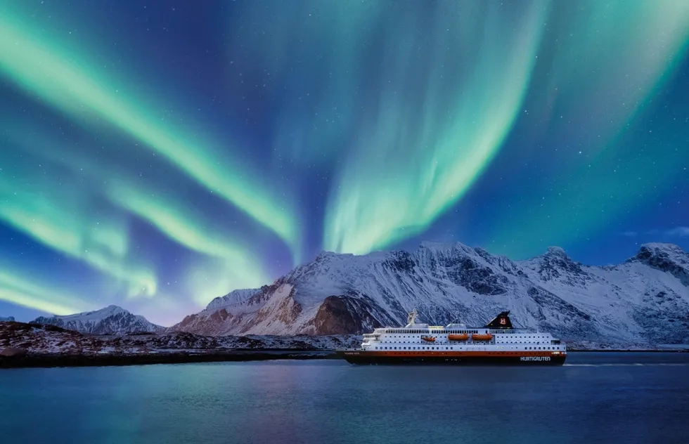 Northern lights over a Hurtigruten ship