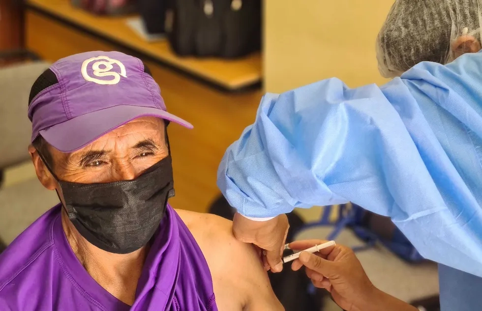 G Adventures porter on Inca Trail receives Covid-19 vaccine