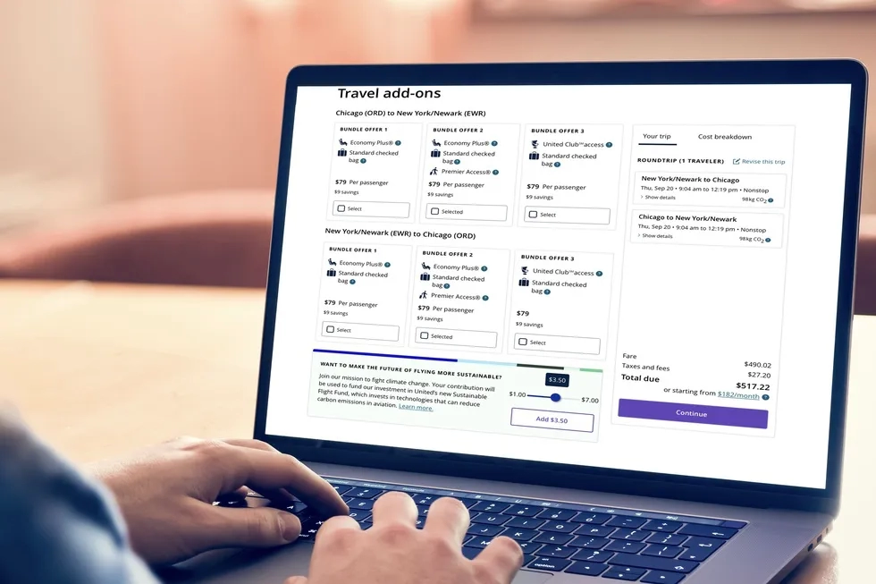 United Airlines Sustainable Fuel Fund prompt on laptop booking screen