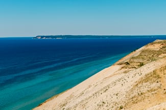 Towering Dunes, Black Sands, and Swimming Next to Skyscrapers: 5 Unique Midwest Beaches