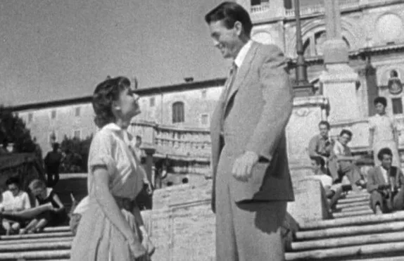 Audrey Hepburn and Gregory Peck in front of the Spanish Steps in "Roman Holiday"
