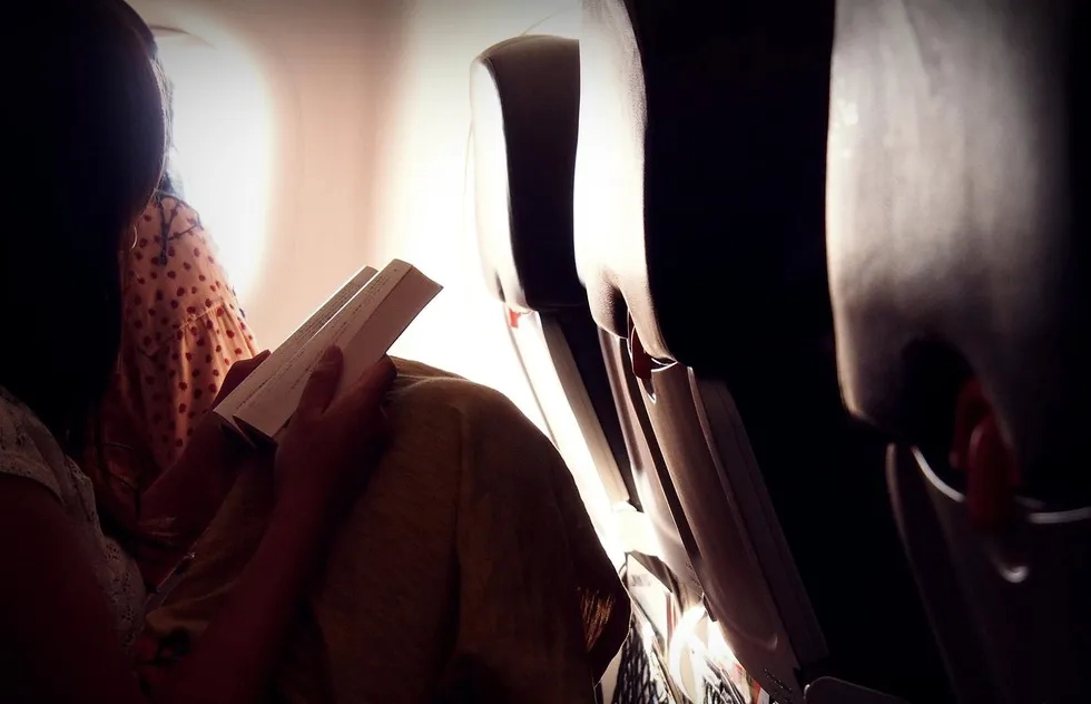Airline cabin, cramped seat