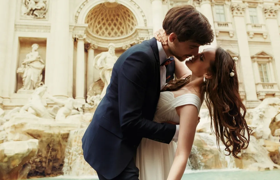 Bride and groom at the Trevi Fountain in Rome