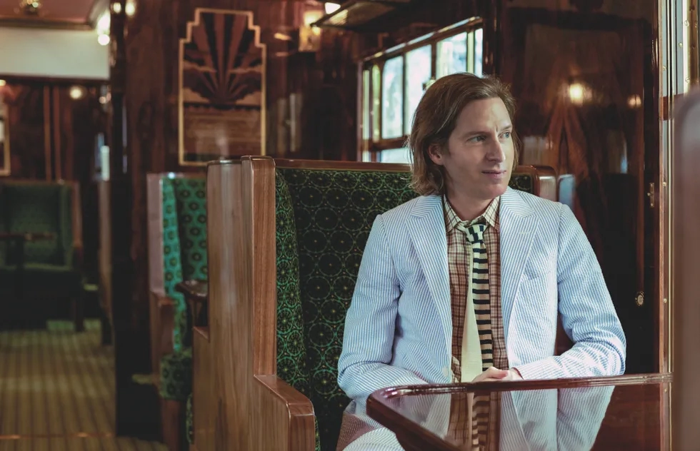 Filmmaker Wes Anderson in the train car he designed for Belmond British Pullman