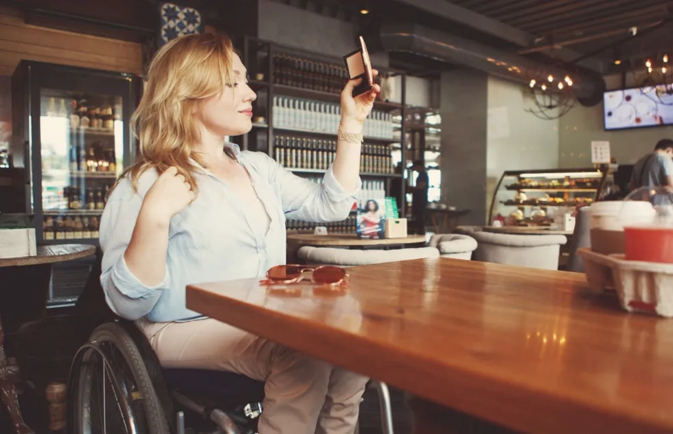 Wheelchair user in a coffee shop