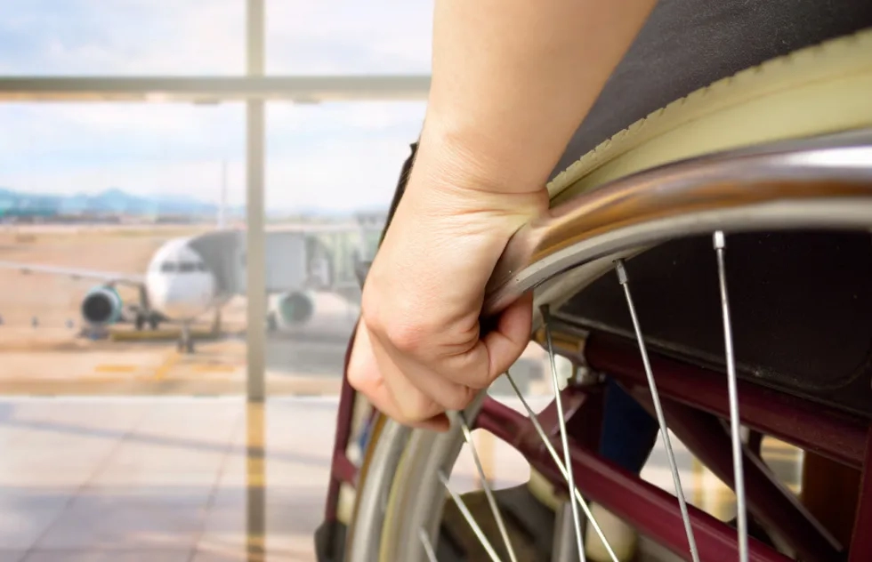 Person using a wheelchair at an airport