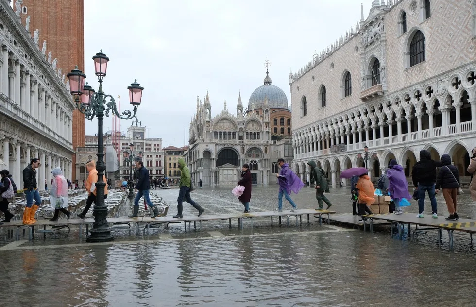 catwalk in St Mark's Square during Venice acqua alta high water