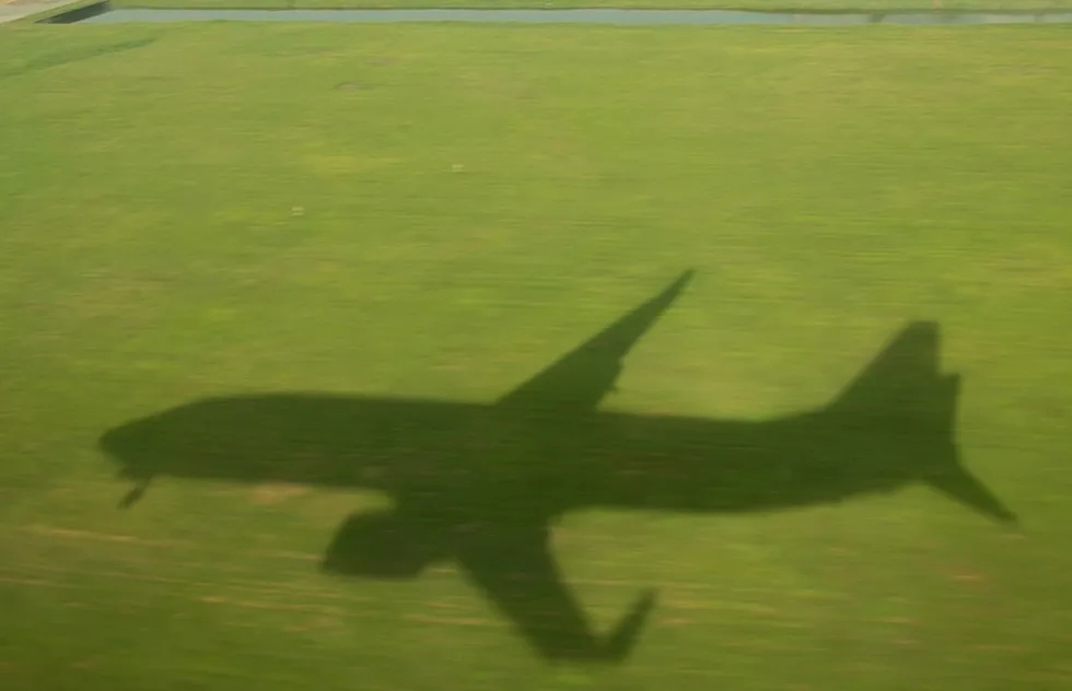 airplane shadow over grass
