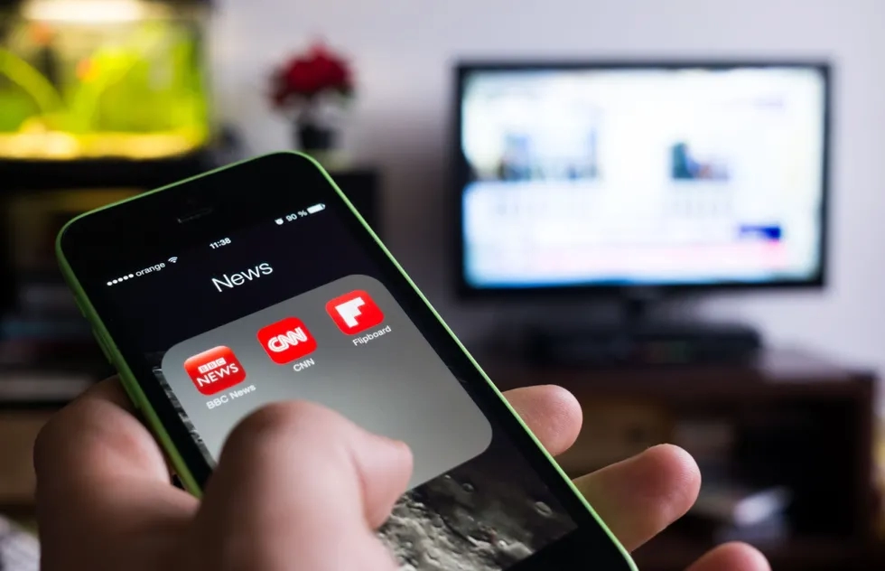 iphone in front of television