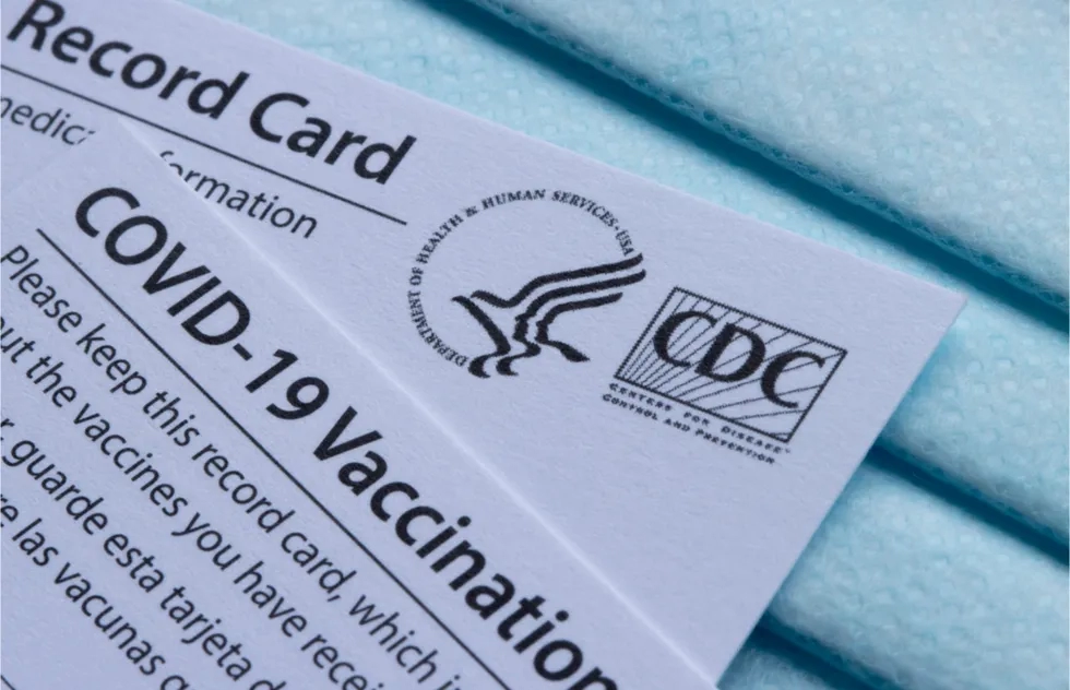 corner of CDC vaccination record cards