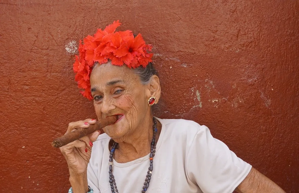 old woman smoking cigar, Cuba
