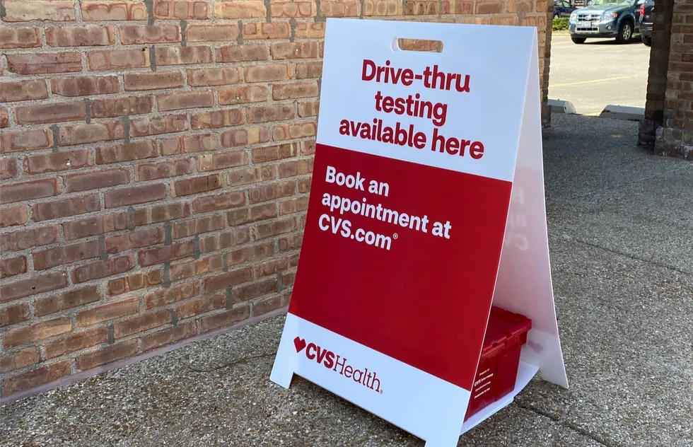 a-frame advertising Covid-19 testing outside a CVS
