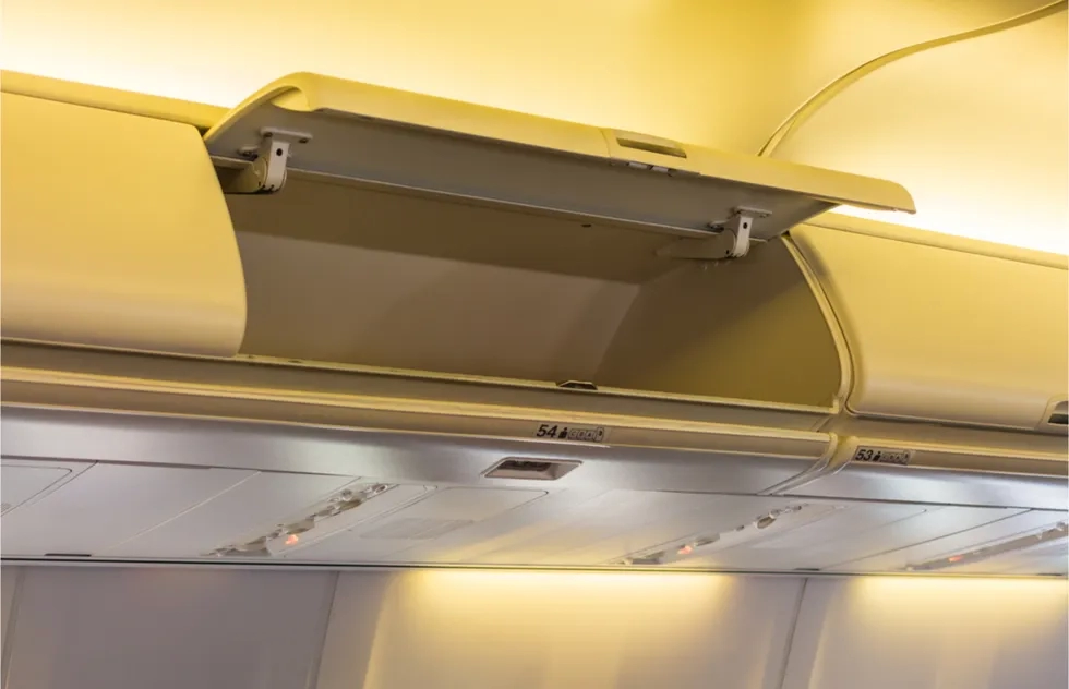 empty and open airline overhead bin