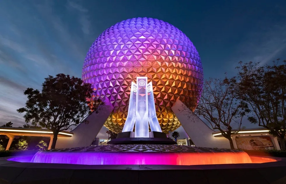 Epcot entrance plaza at dusk, 2021
