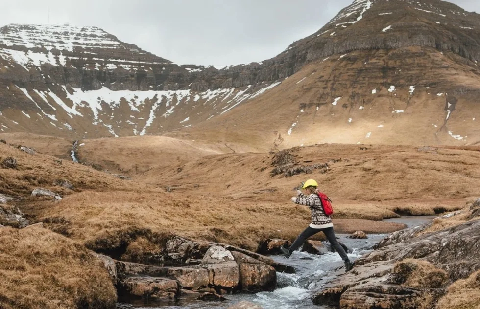 Faroe Islands remote tourist guide in brook