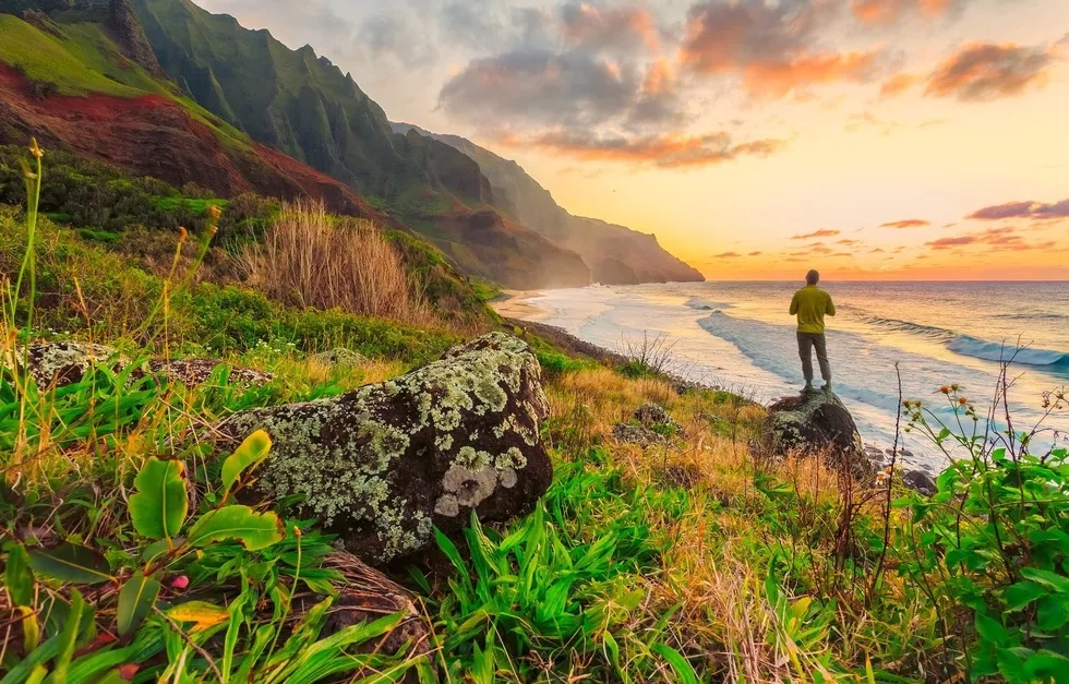 Solo hike on colorful mountainous coast
