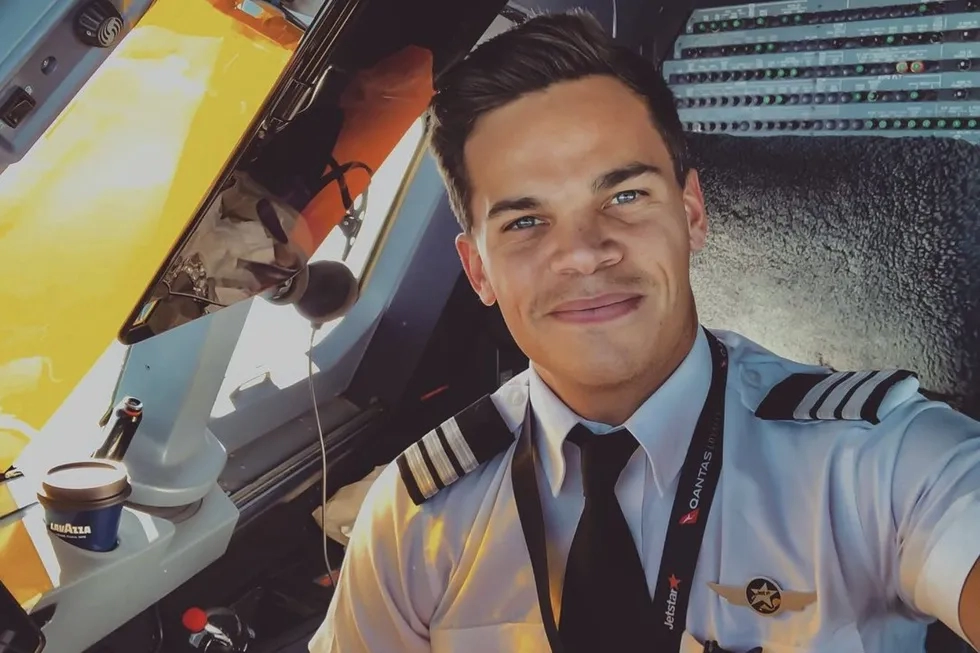 Jimmy Nicholson, pilot, in cockpit