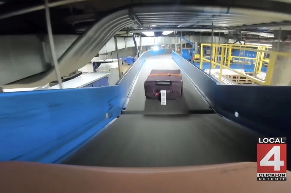 POV luggage on conveyor belt in Detroit airport