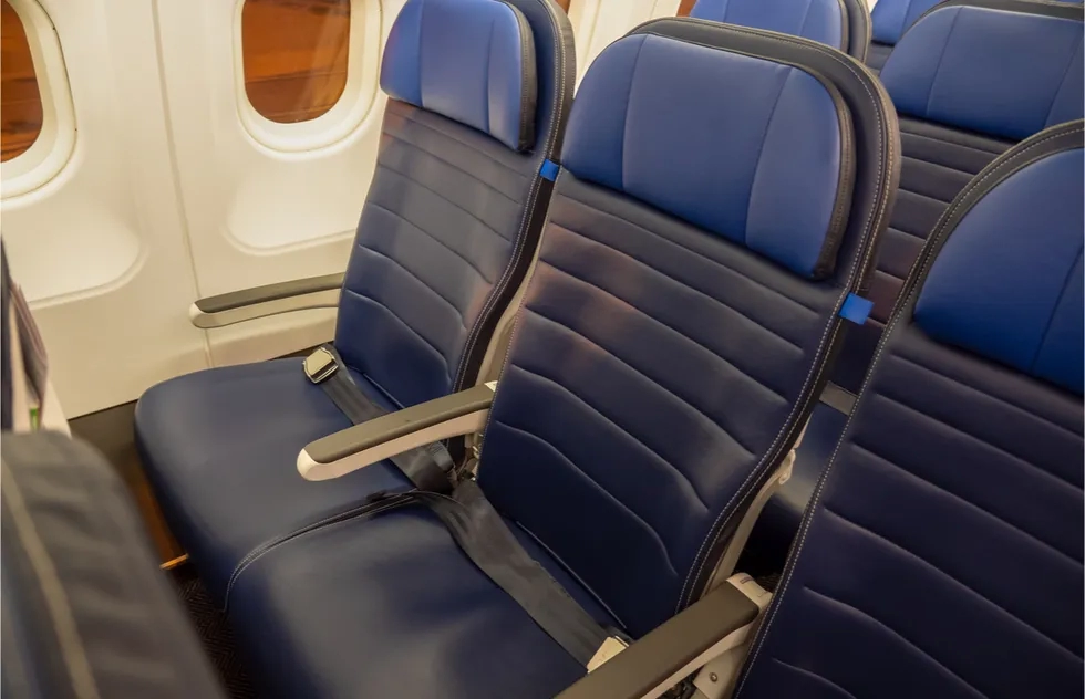 row of 3 empty economy seats