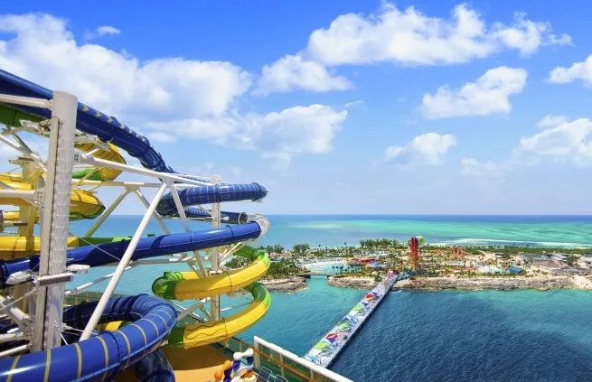 waters slides on Royal Caribbean's Adventure of the Seas with Coco Cay in background