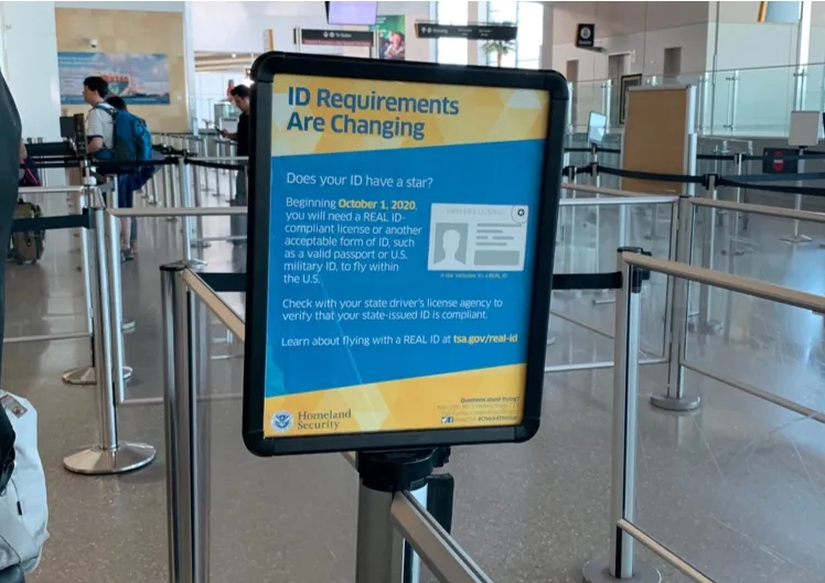 Real ID warning sign at TSA airport line queue