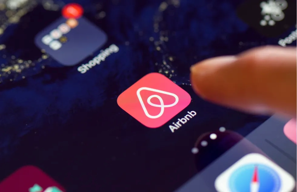 Icon for the Airbnb app on an iPhone screen