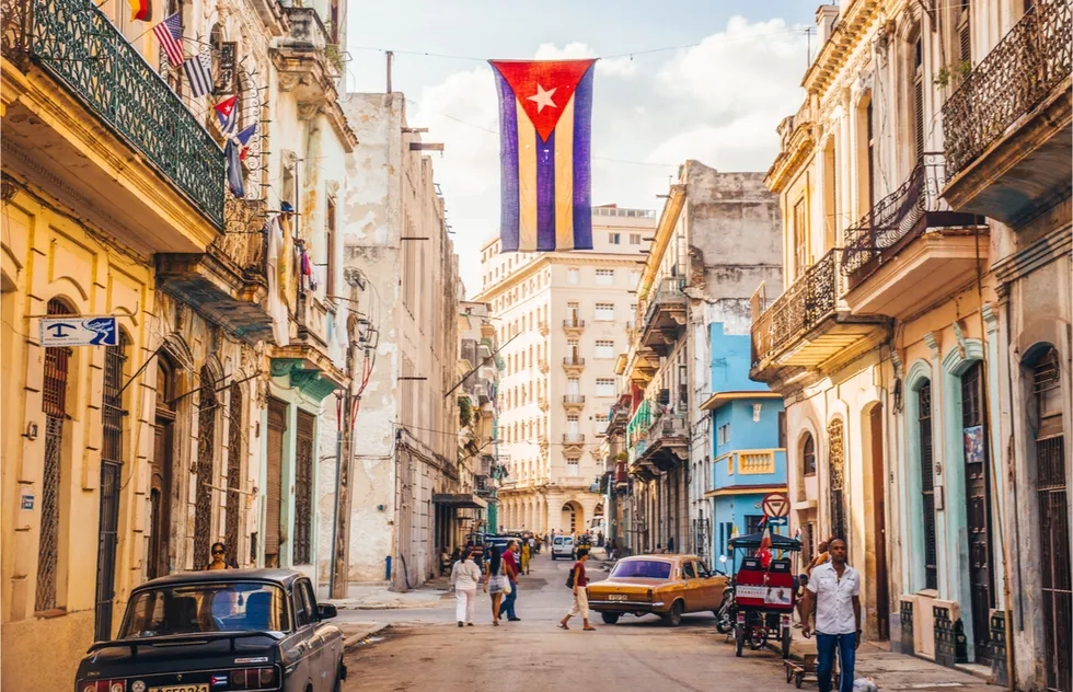 colorful street with Cuban flag in Havana, Cuba