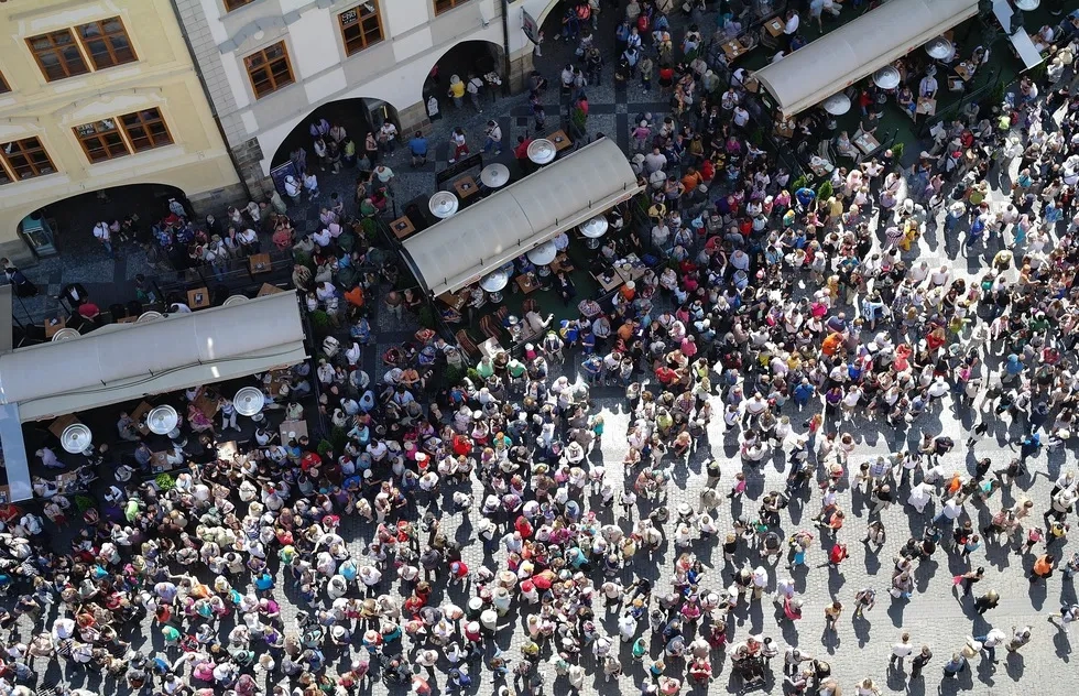 aerial of crowd of tourists, unknown European city