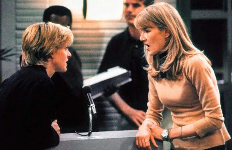 Ellen DeGeneres and Laura Dern at airline gate desk