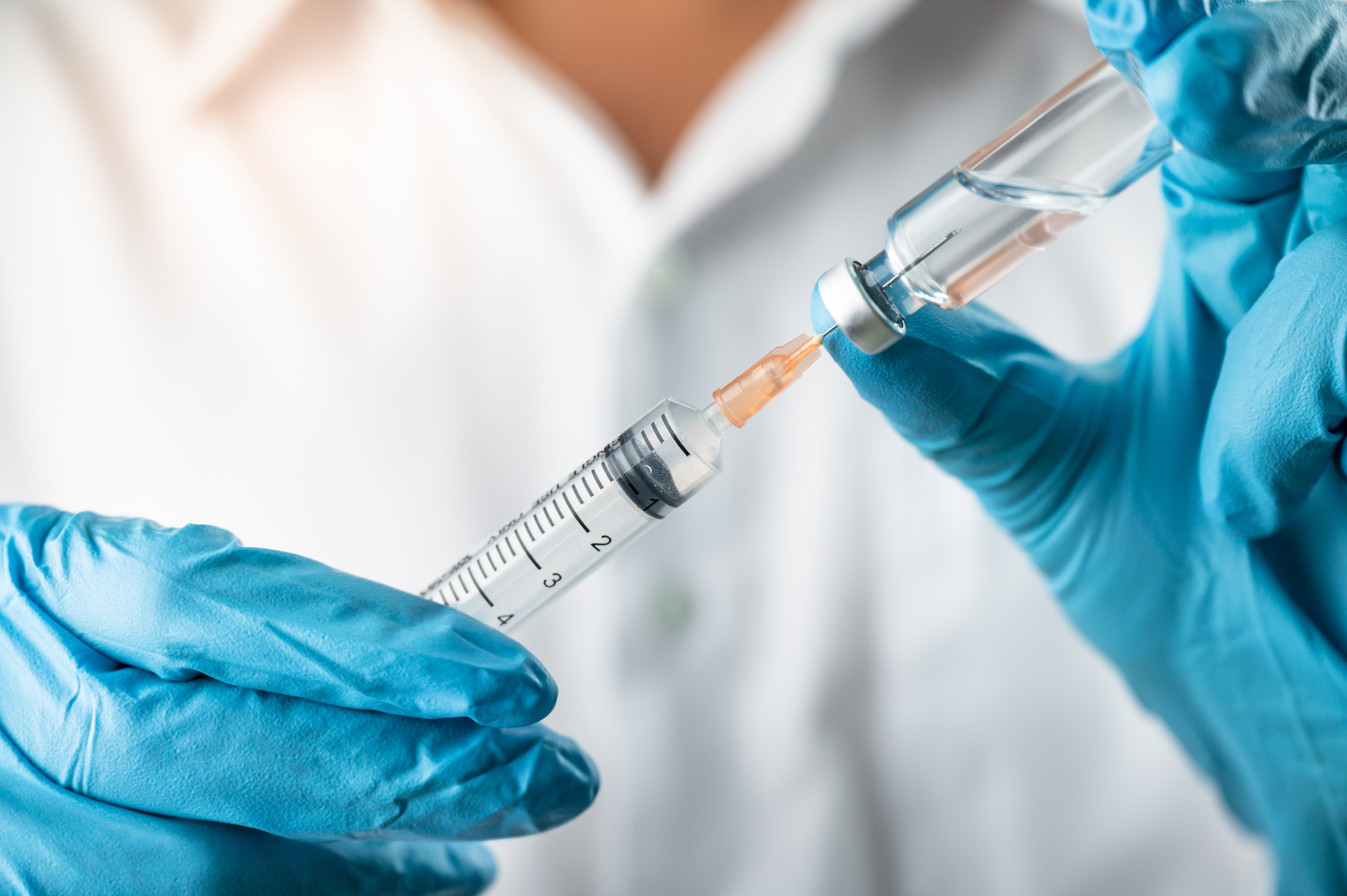 Syringe and vaccine