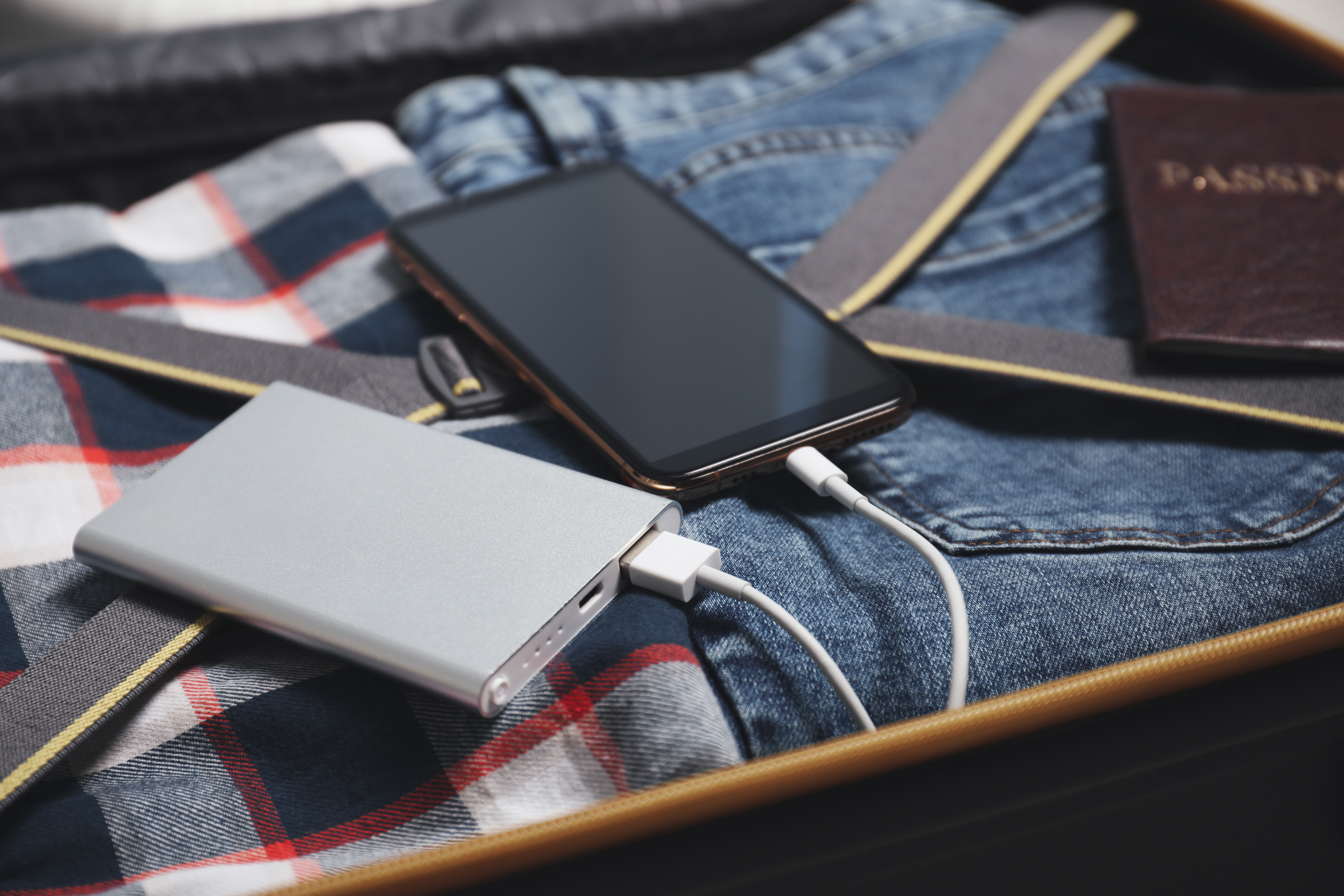 Power bank and cell phone in suitcase