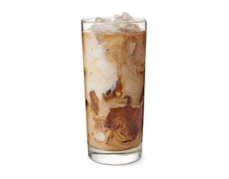 Cinnamon Iced Dolce Coffee in a clear glass
