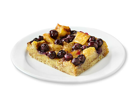 Lemon Blueberry Bread Pudding on a white plate