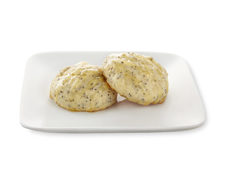 two Lemon Poppy seed Cookies on a white plate