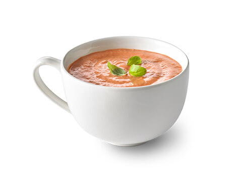 Creamy Tomato Basil Soup in a white mug