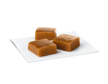 Three Caramels on a plate