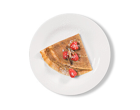 Chocolate Crêpes with berries on a plate