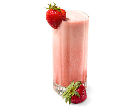 Strawberry Banana Sunrise Smoothie in a clear glass