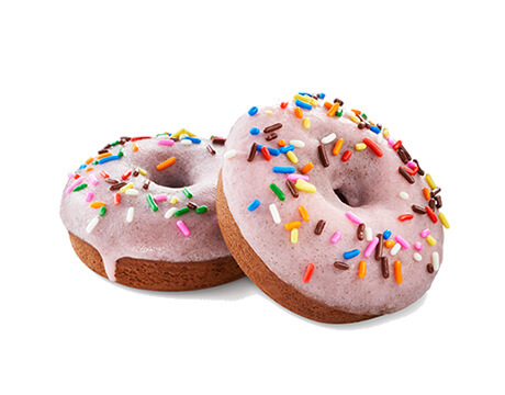 Two chocolate donuts with pink glaze and sprinkles