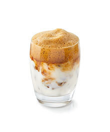 Glass of Delgona whipped coffee