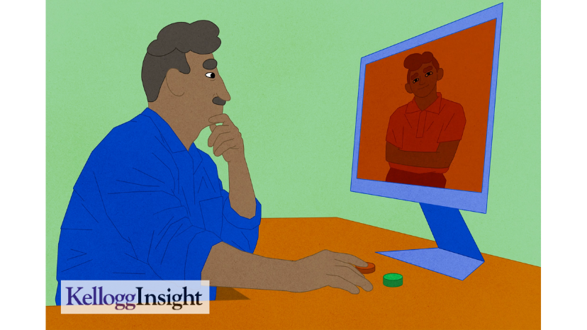 Image of a man looking at a computer screen