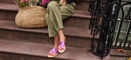 Close up of women sitting on stoop